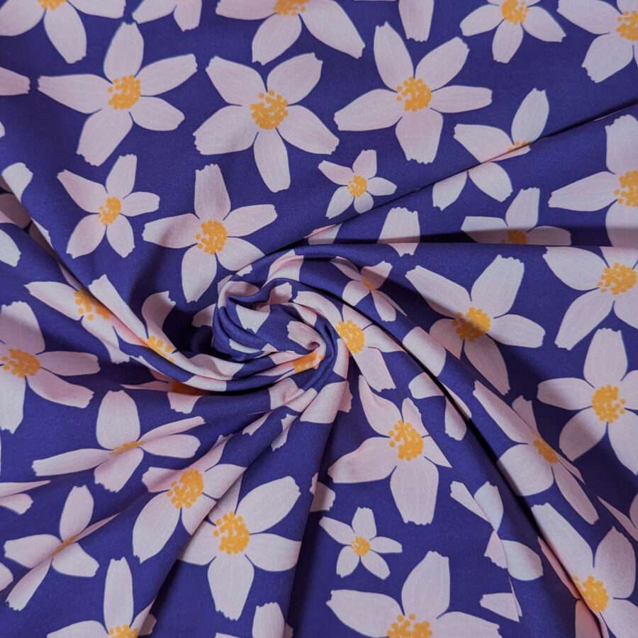 tissu grosse fleur fond violet jersey