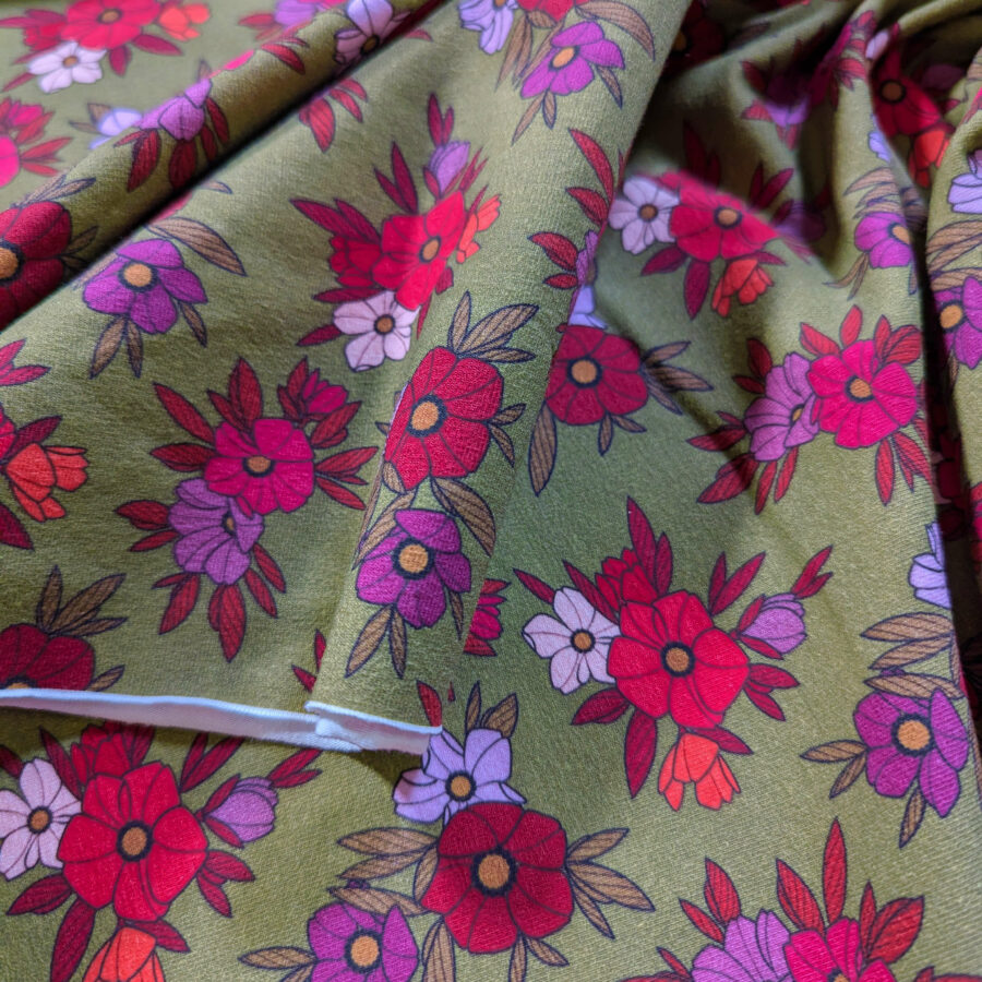 tissu vert fleur rose