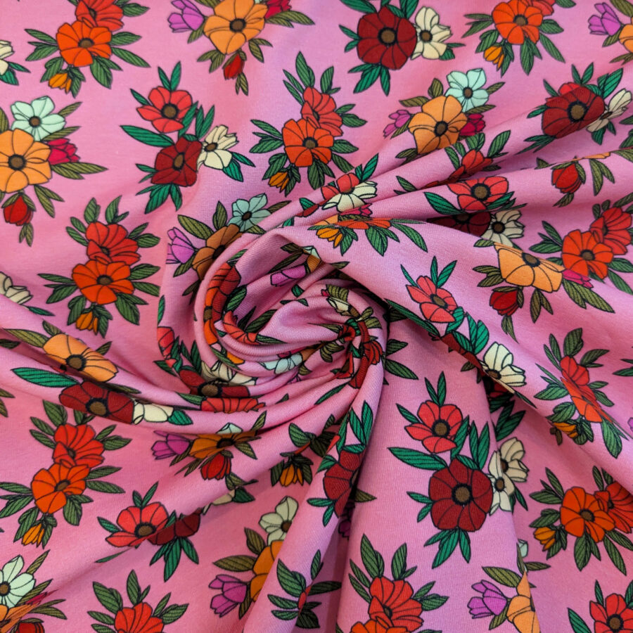 Tissu jersey coton fleurs rose orange