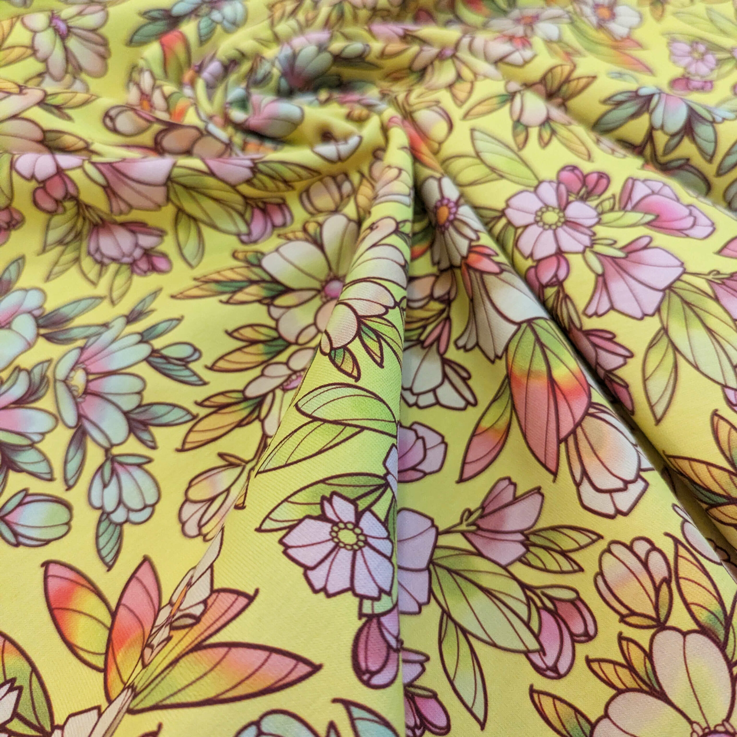 Tissu coton jaune fleurs