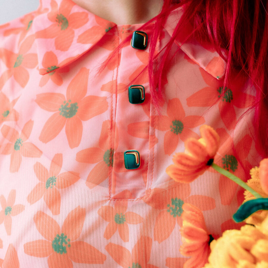 Tissu mesh fleur orange vert transparent polo