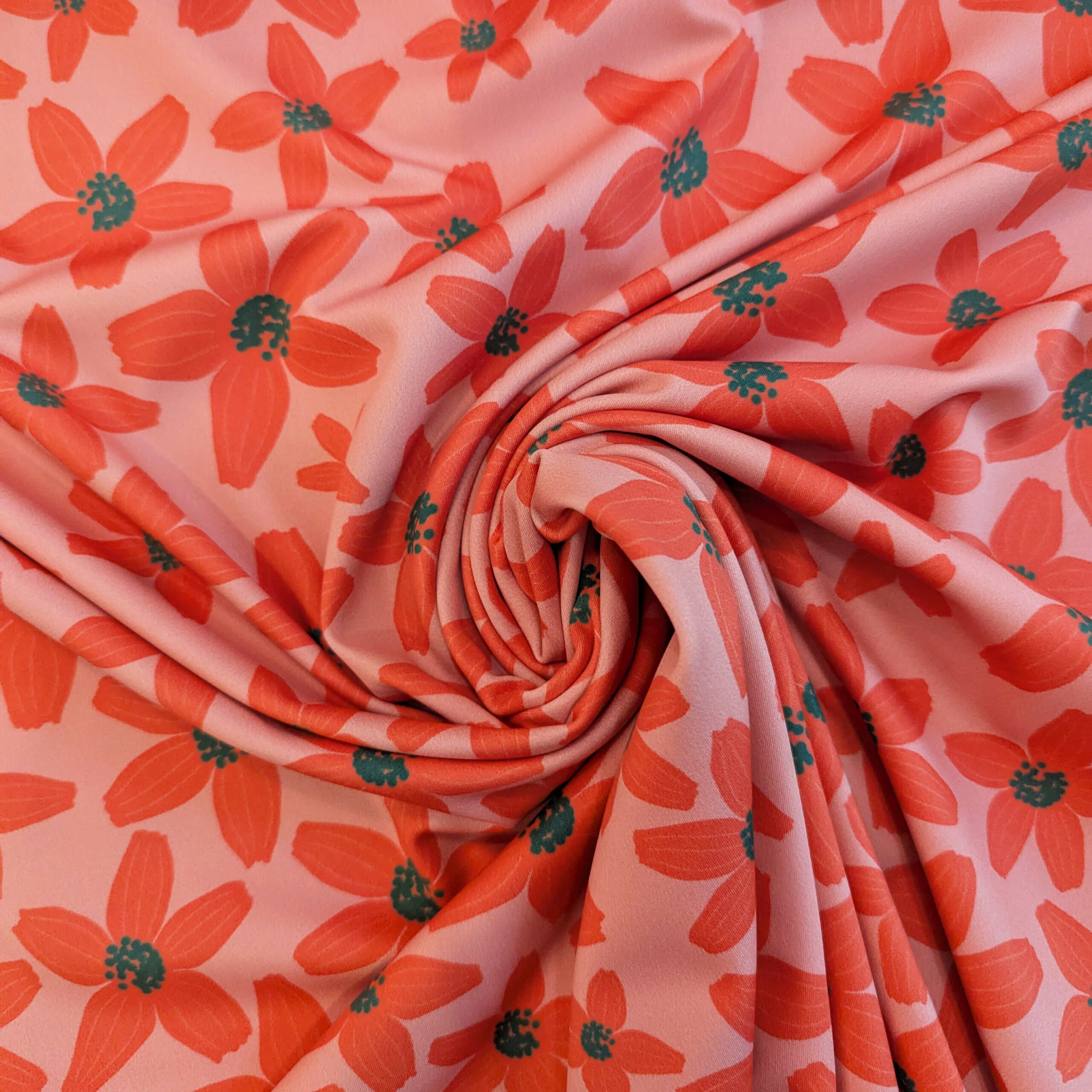 Lycra fleurs orange vert