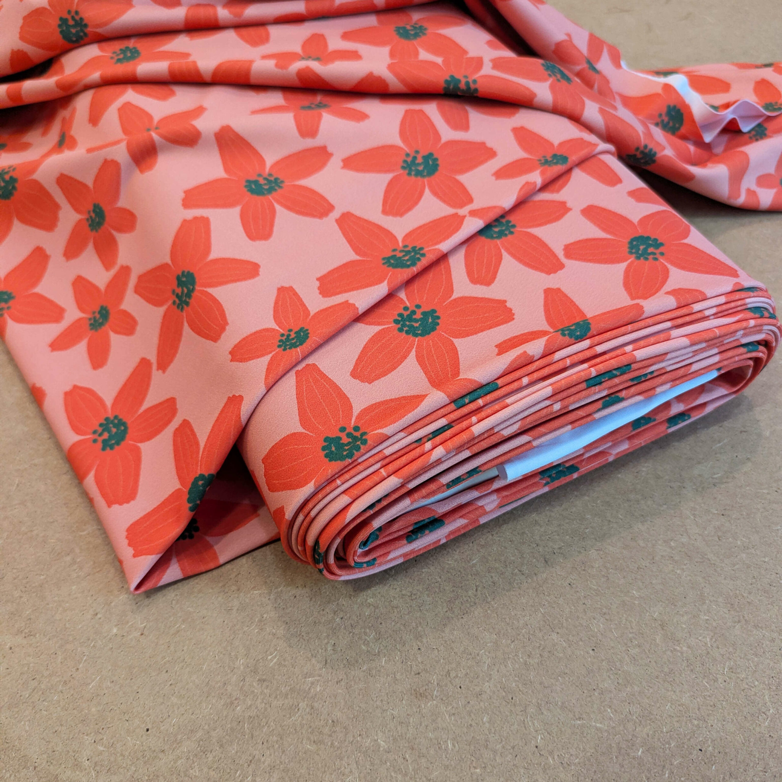Lycra fleurs orange vert