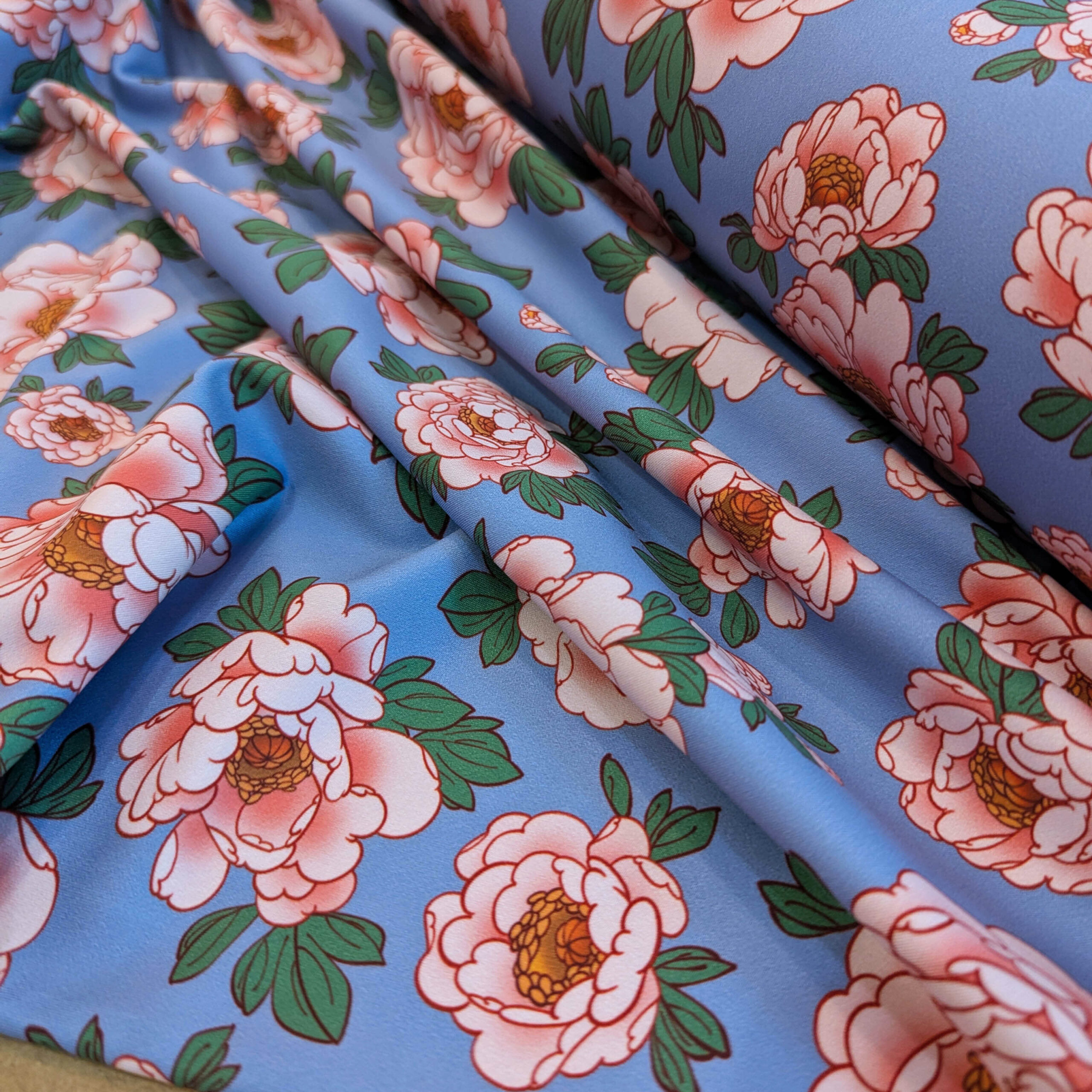 Tissu lycra bleu rose fleurs