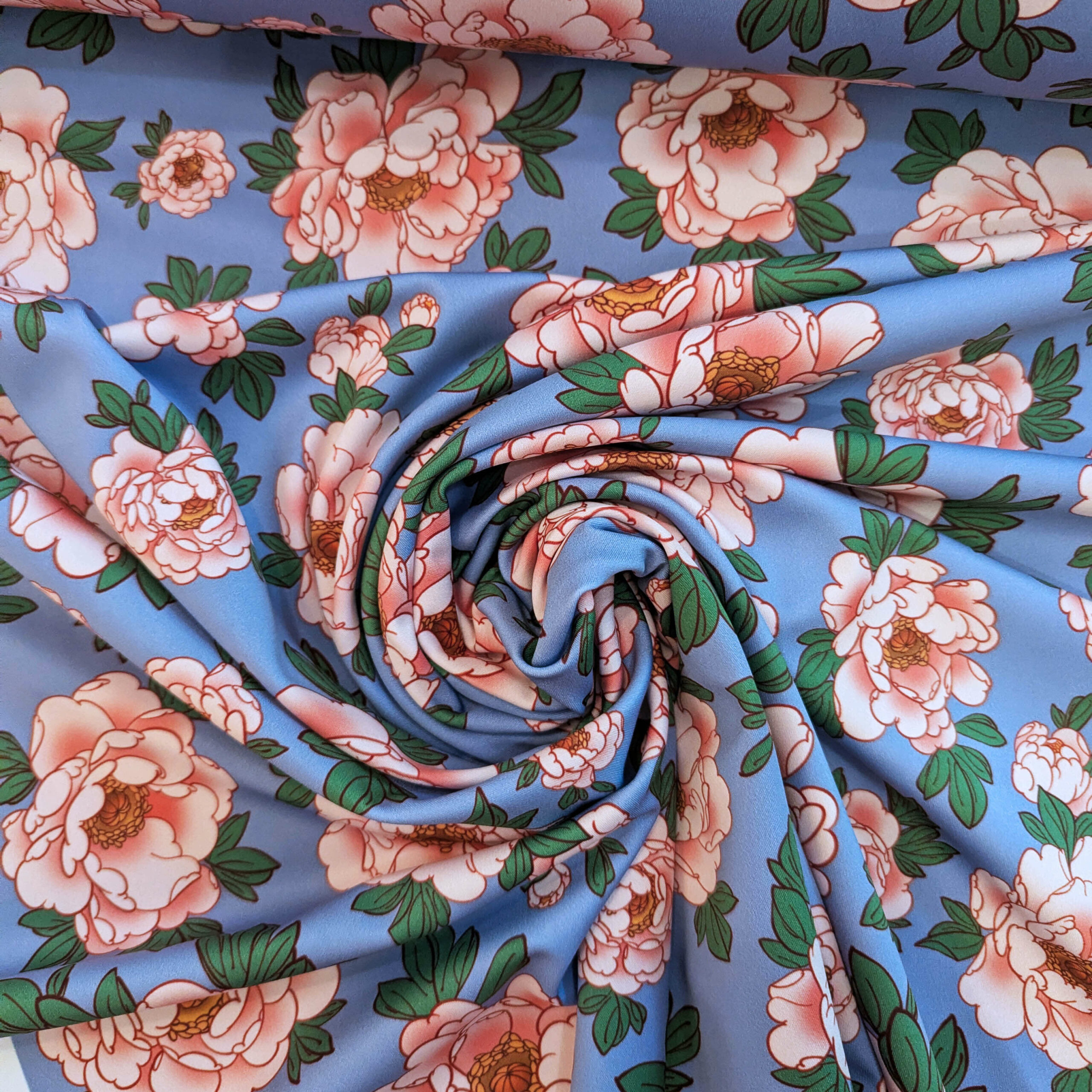 Tissu lycra bleu rose fleurs