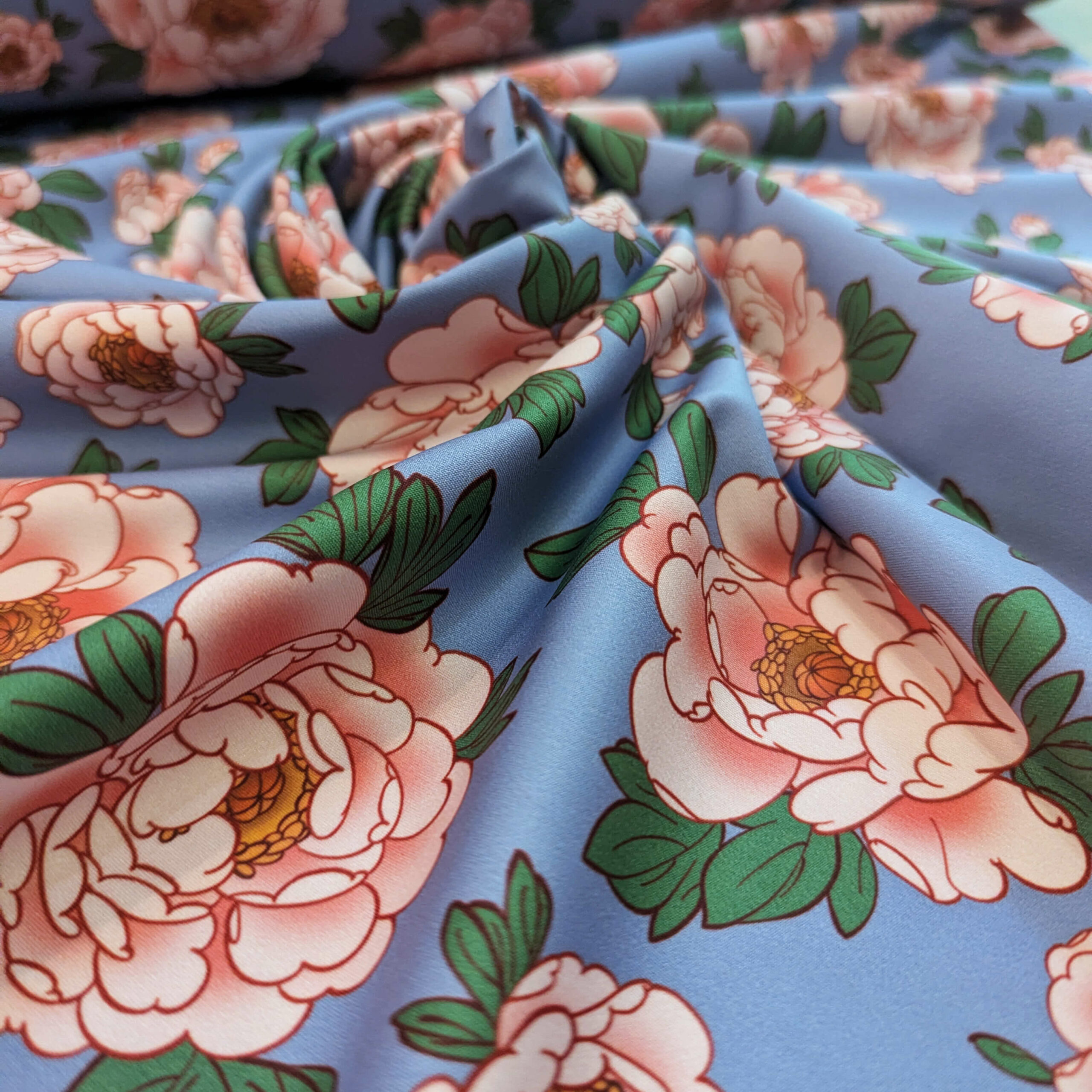 Tissu lycra bleu rose fleurs