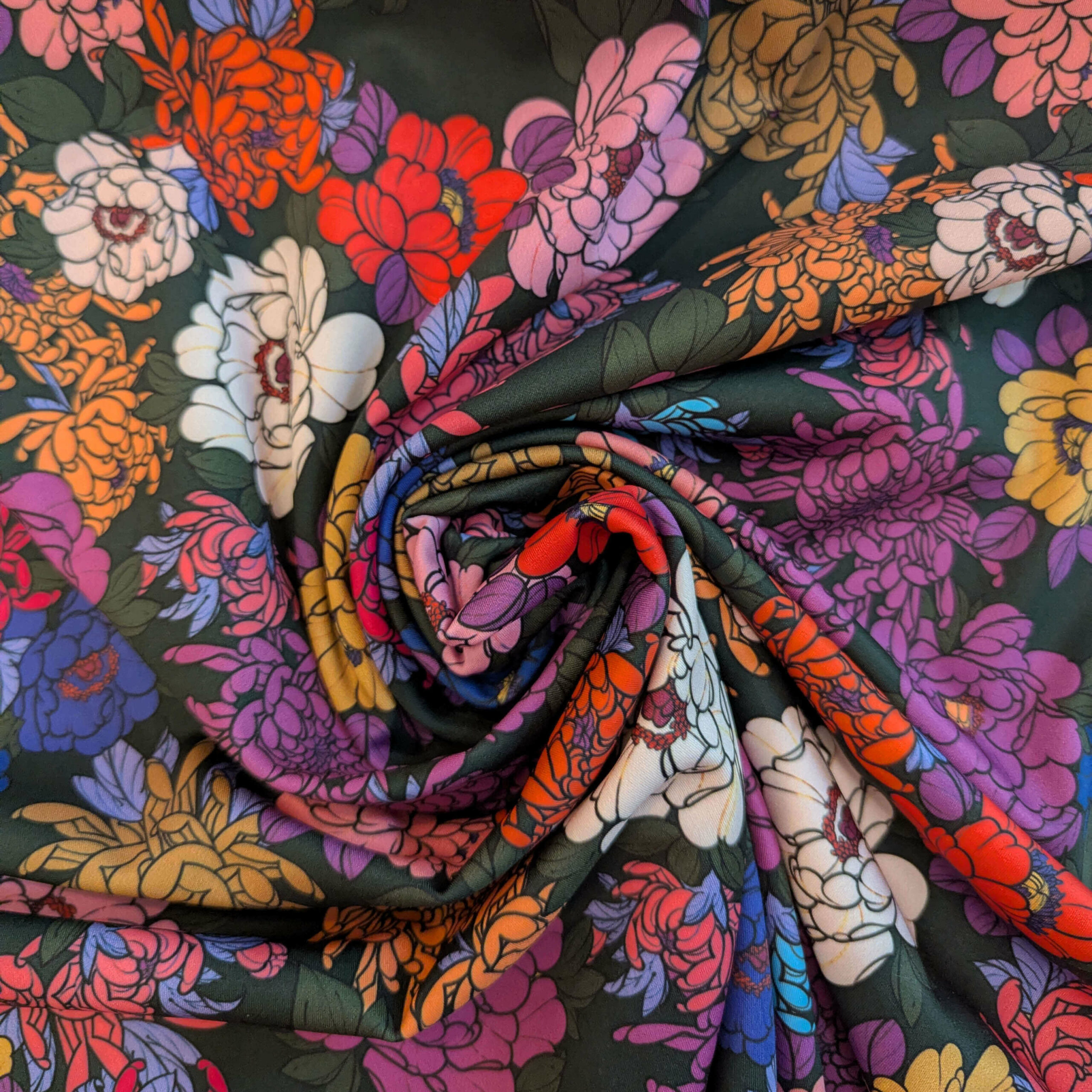 Tissu vert fleurs lycra
